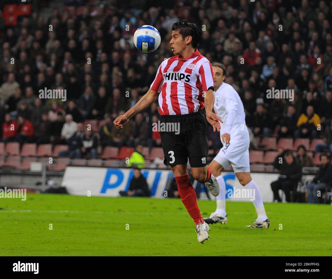 EINDHOVEN, NEDERLAND. MARCH 12: Carlos Salcido (PSV)  During UEFA Cup Round of 16 Second Leg between PSV Eindhoven and Tottenham Hotspur at  Philips S Stock Photo
