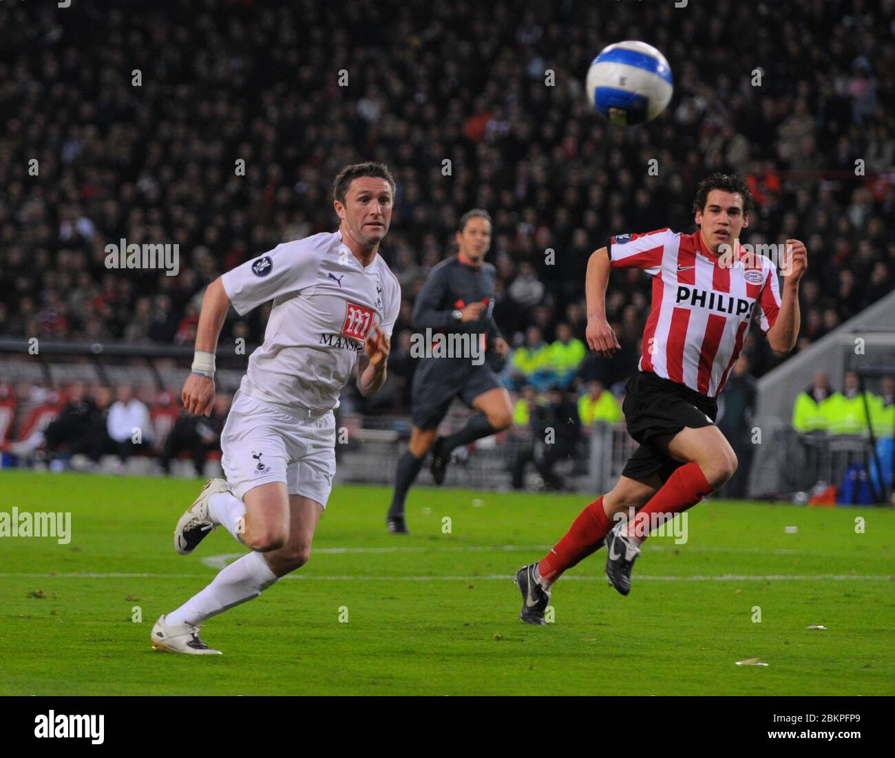 EINDHOVEN, NEDERLAND. MARCH 12: Robbie Keane of Tottenham Hotspur During UEFA Cup Round of 16 Second Leg between PSV Eindhoven and Tottenham Hotspur a Stock Photo