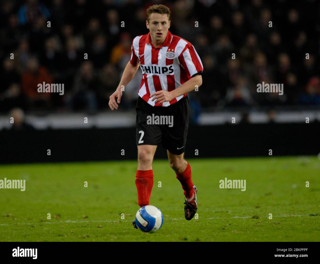 EINDHOVEN, NEDERLAND. MARCH 12: Jan Kromkamp of PSV Eindhoven During UEFA Cup Round of 16 Second Leg between PSV Eindhoven and Tottenham Hotspur at  P Stock Photo