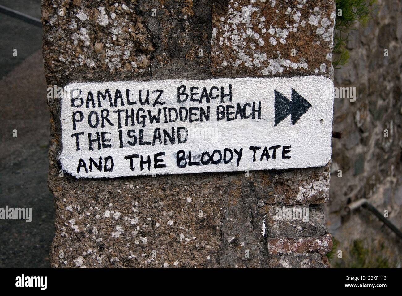 An amusing sign painted on a wall in the fishing village of St Ives, Cornwall Stock Photo