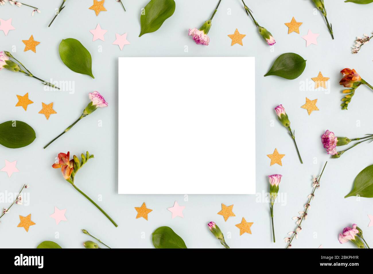 Download Square Paper Card Mockup Pattern Made Of Flowers And Confetti On A Blue Pastel Background Holiday Design With Copy Space Stock Photo Alamy