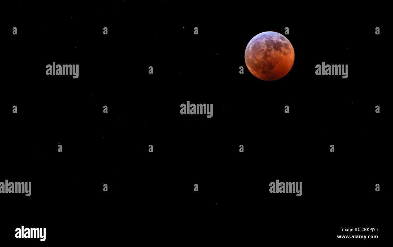 Lunar eclipse during totality Stock Photo - Alamy