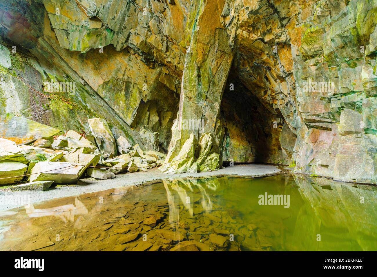 The great cave of Cathedral Quarry at Tilberthwaite in the Lake District Stock Photo