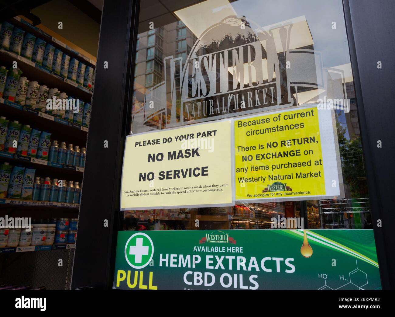 no mask, no service sign and stating no returns or exchanges on purchases at Westerly Natural Market due to the coronavirus or covid-19 pandemic. Stock Photo