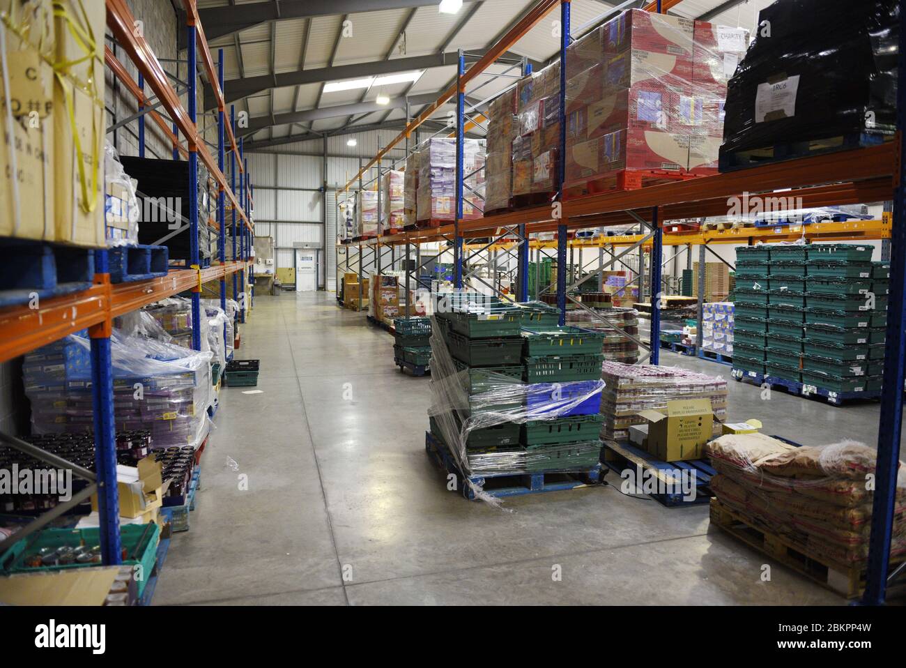 A large warehouse in the UK with supplies for a food bank Stock Photo