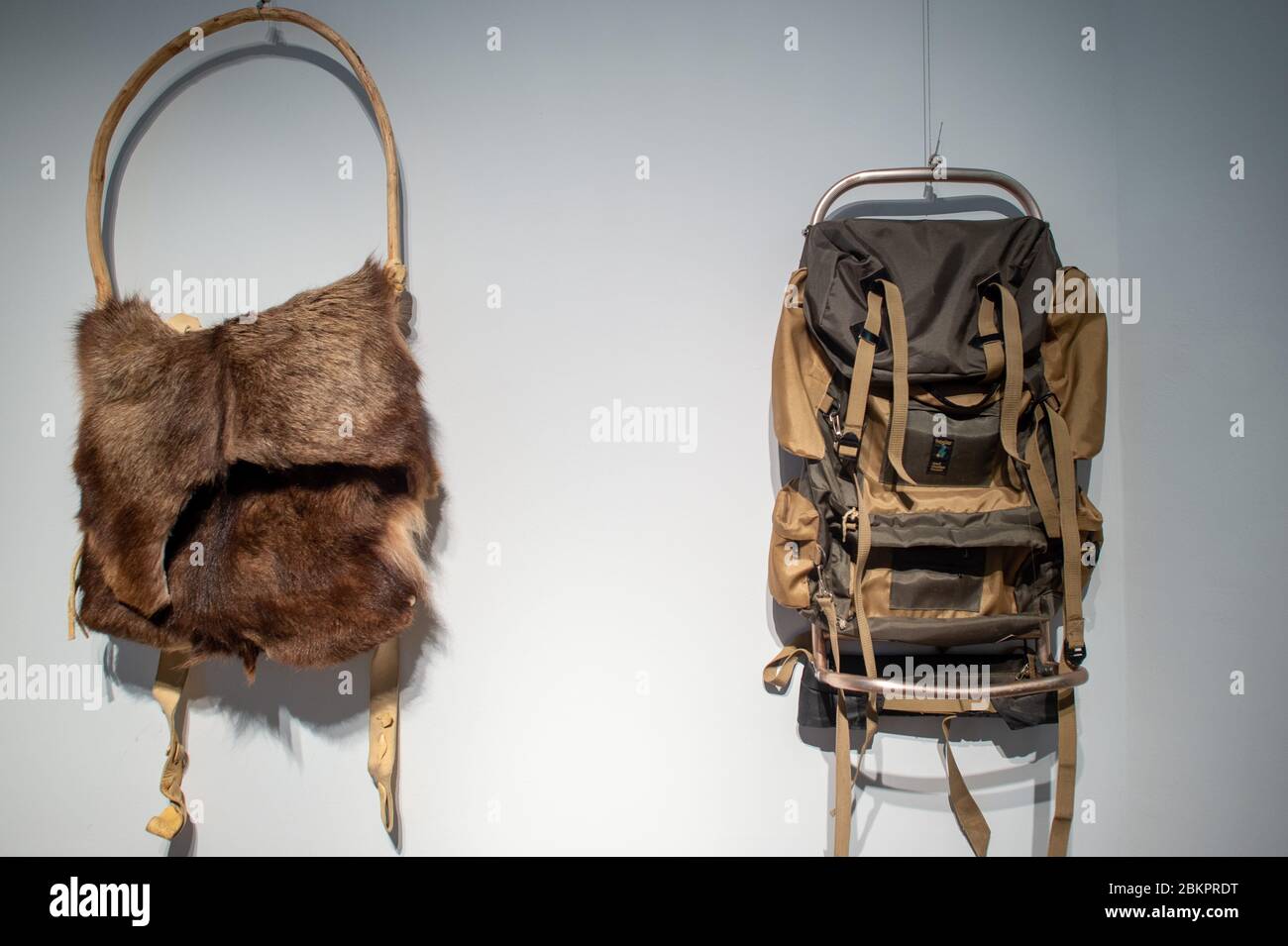 05 May 2020, Saxony-Anhalt, Magdeburg: The replica (l.) of the rucksack of  the Stone Age man "Ötzi", who was discovered in the Ötztal Alps in 1991,  hangs in the Museum of Natural