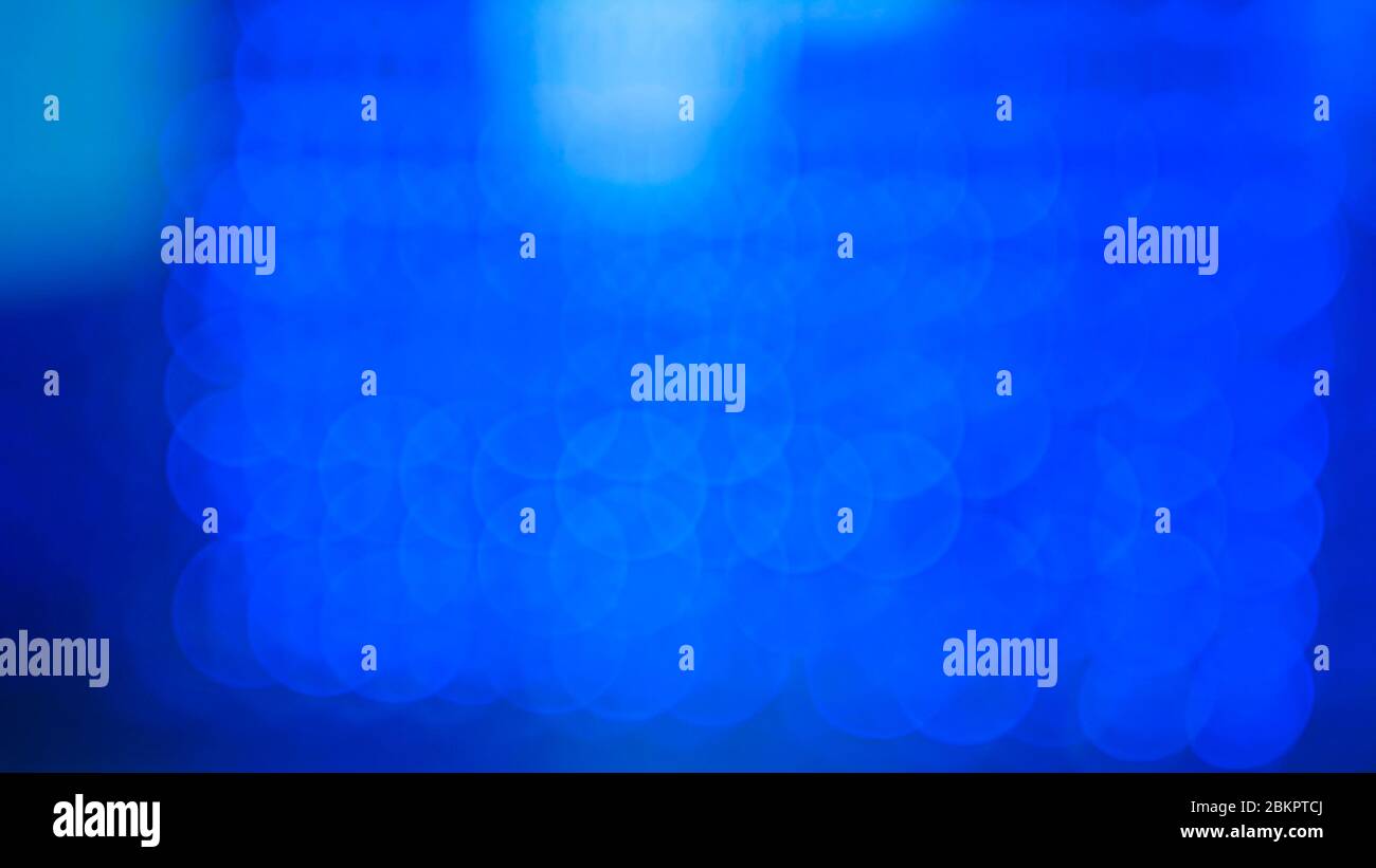 Abstract background - light blue blurred bokeh light Stock Photo - Alamy