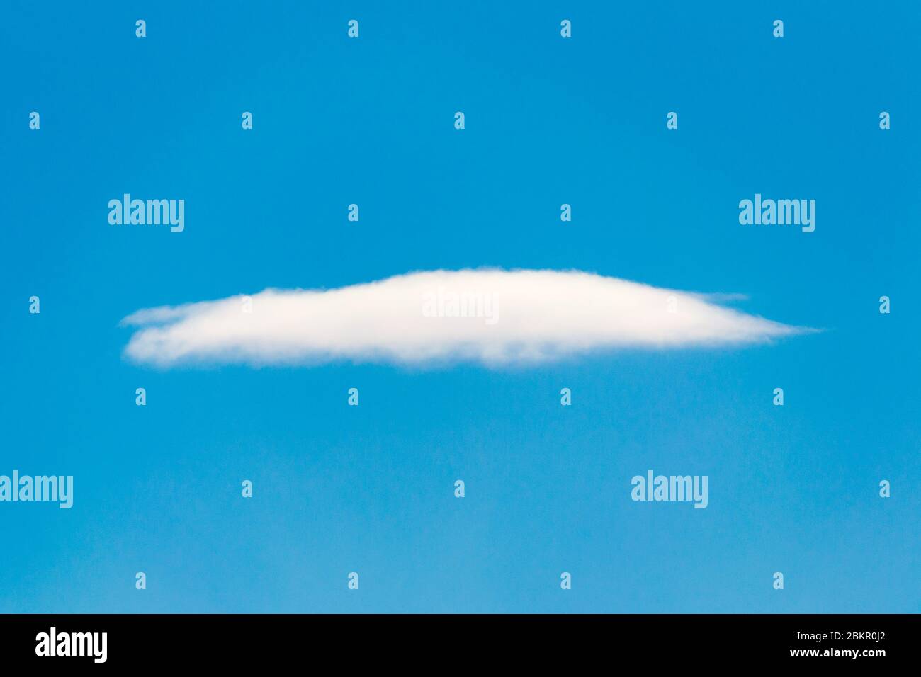 single white cloud on clear blue sky background Stock Photo