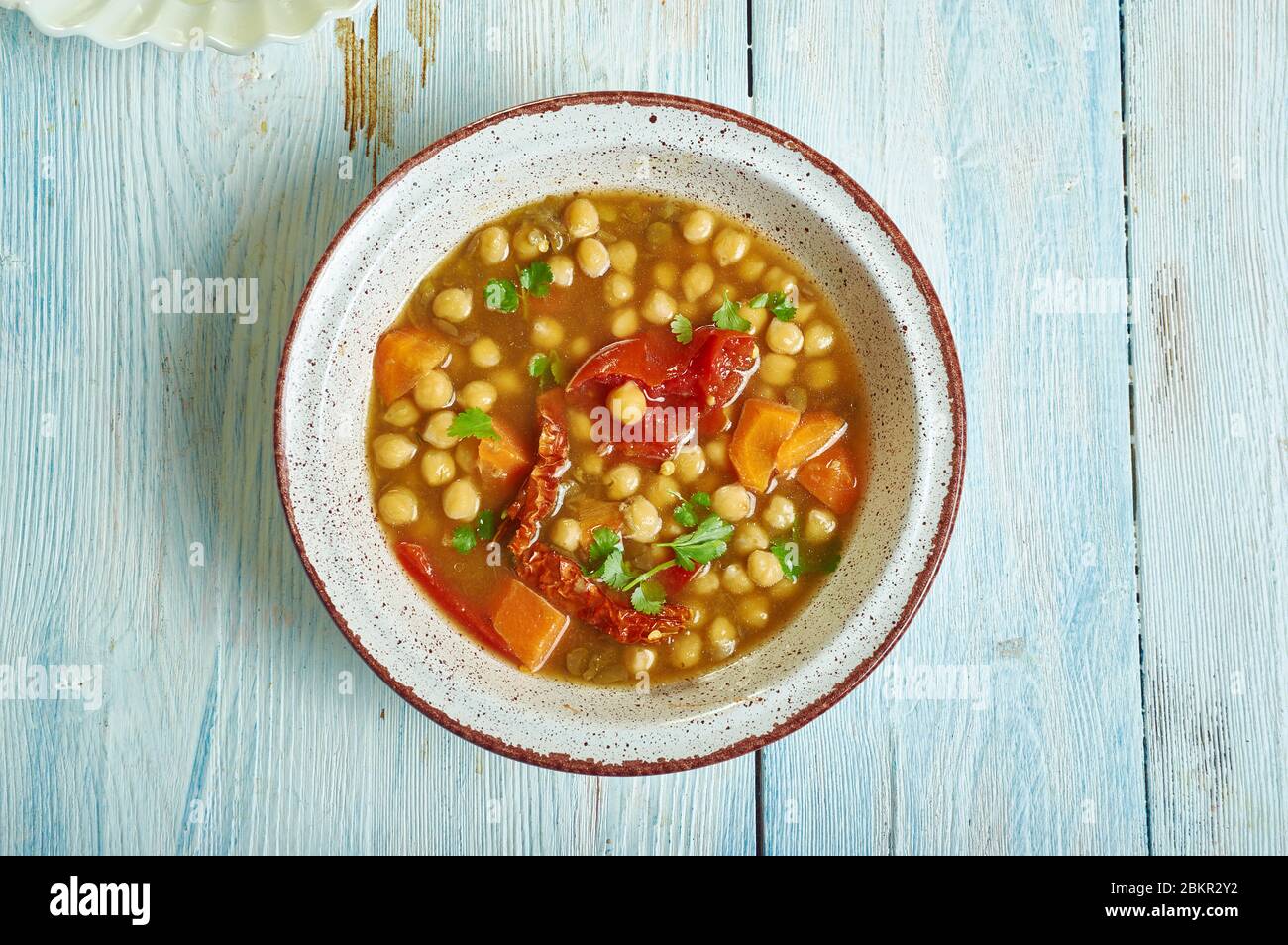 Moroccan Chickpea, Carrot, and Spinach Soup close up Stock Photo - Alamy