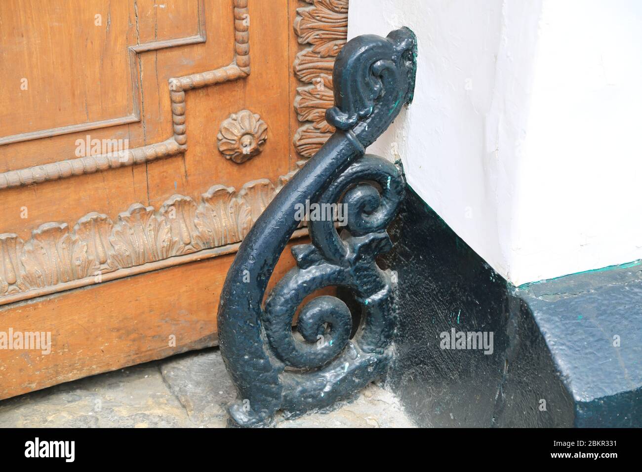 Door decorations of one old building in the colonial city of Trujillo in Peru Stock Photo