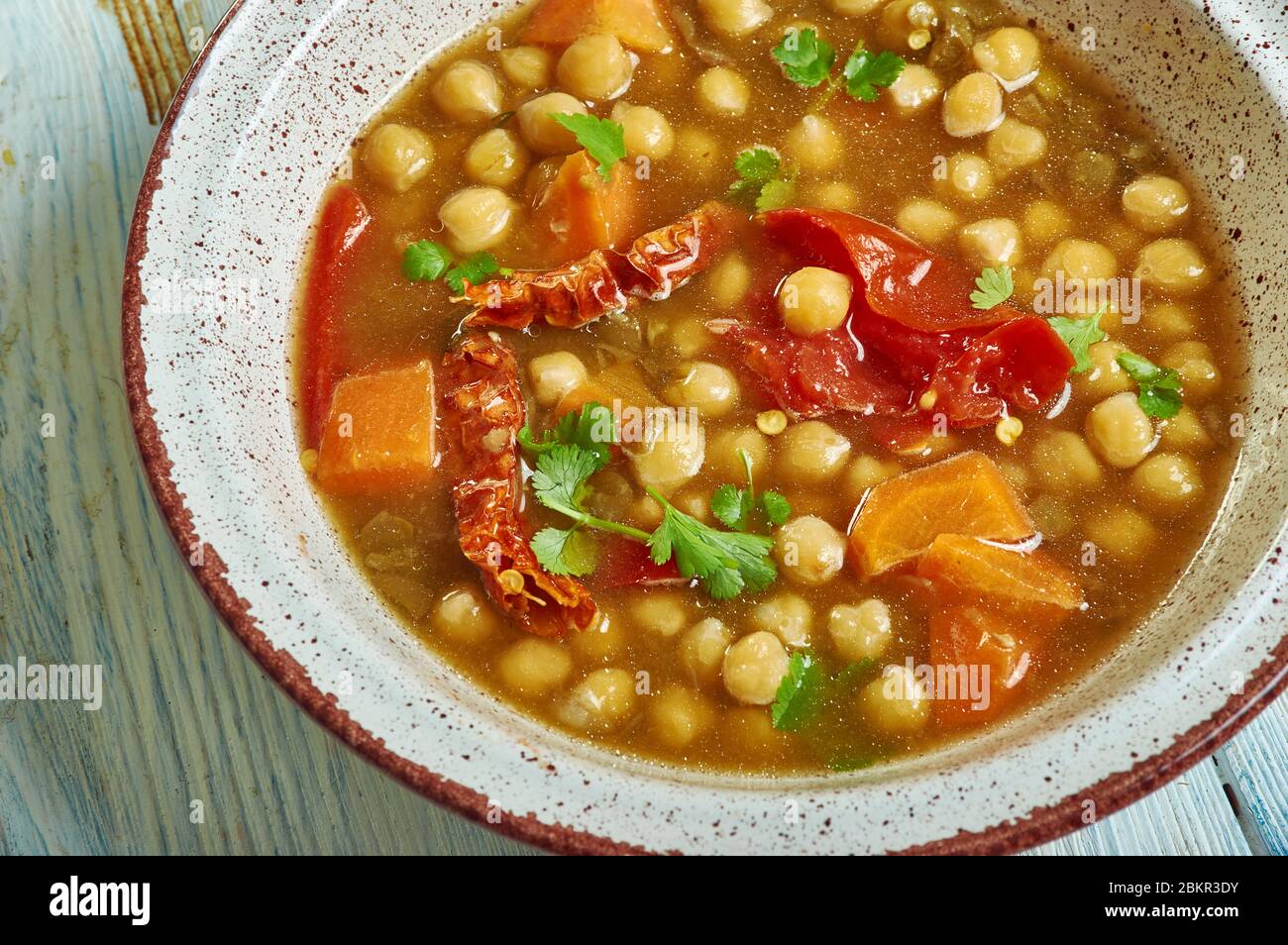 Moroccan Chickpea, Carrot, and Spinach Soup close up Stock Photo - Alamy