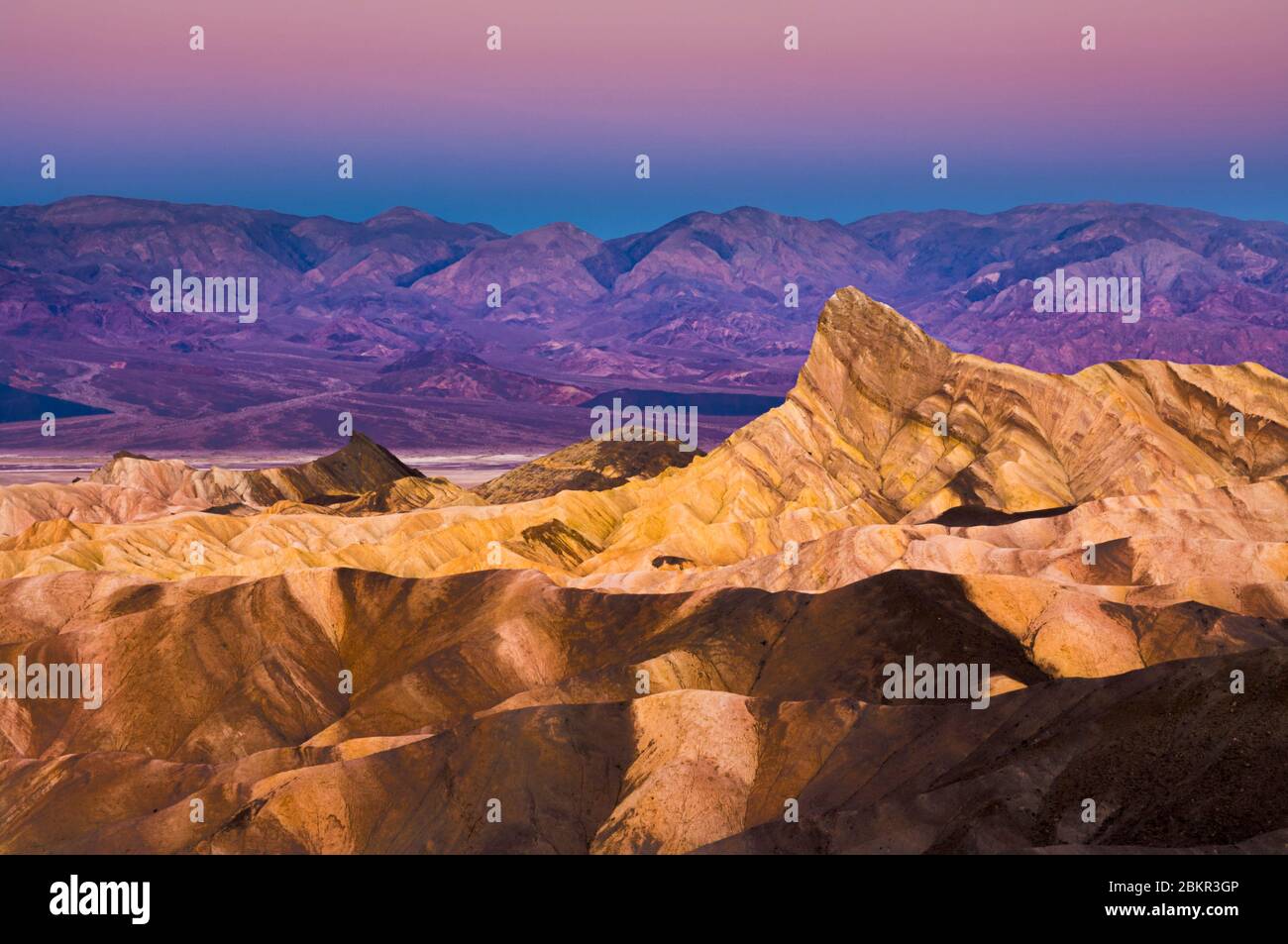 Sunrise at Manly Beacon  Zabriskie Point, Furnace creek, Death Valley National Park, California, USA Stock Photo