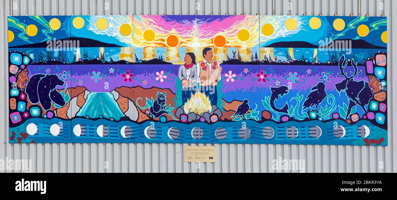 Canada, Northwest Territories, Yellowknife, mural painting Gho Bah - Gombaa which means first light of dawn in the Sahtu - Weledeh languages, artists John Rombough, Carla Rae Taylor and Melaw Nakehk'o Stock Photo