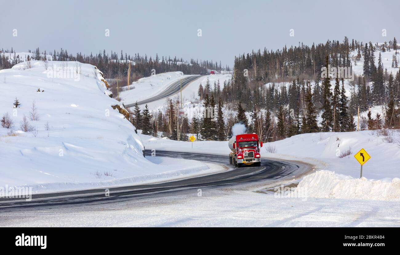 Canada, Northwest Territories, Yellowknife, the start of route number 4 north also called Ingraham Trail, truck crossing Stock Photo