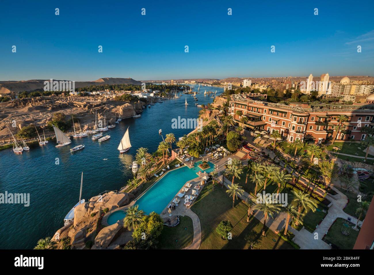 Egypt, Upper Egypt, Nile valley, Aswan, the Sofitel Legend Old Cataract Hotel in front of Elephantine island Stock Photo