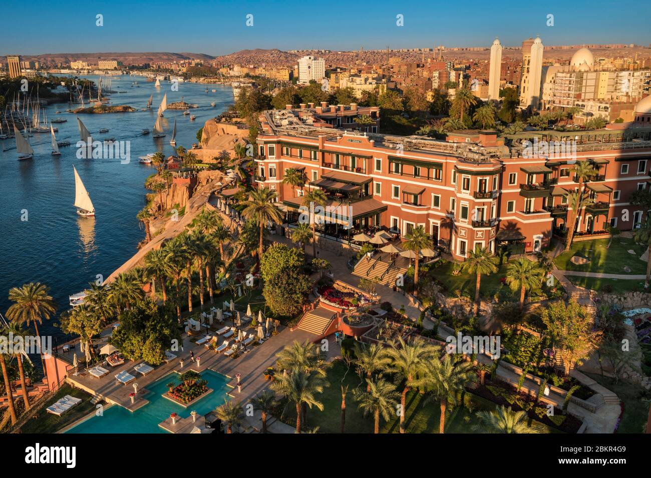 Egypt, Upper Egypt, Nile valley, Aswan, the Sofitel Legend Old Cataract Hotel in front of Elephantine island Stock Photo