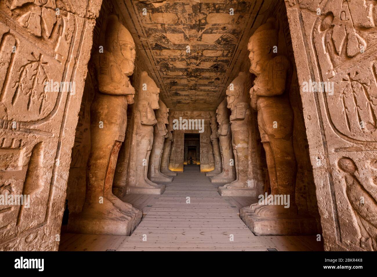Egypt, Upper Egypt, Nubia, Abu Simbel, UNESCO World Heritage Site, temple of Ramses II, Osirian pillars bearing the image of Ramses II supporting the pronaos (hypostyle hall) Stock Photo