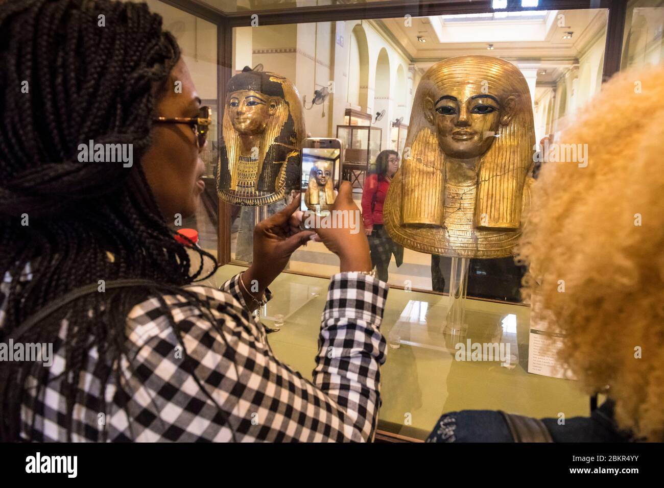 Egypt, Cairo, Egyptian museum of Cairo, funeral masks of Yuya mummy, tourists Stock Photo