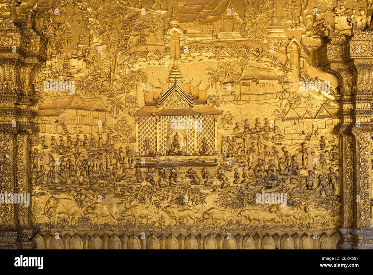 Laos, Luang Prabang city classified UNESCO world heritage, Wat Mai temple, bas relief carving on the wall Stock Photo