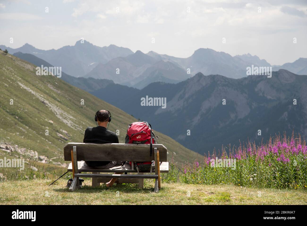 France, Hautes-Alpes (05), Queyras regional natural park, Arvieux, hiker enjoying the panorama Stock Photo