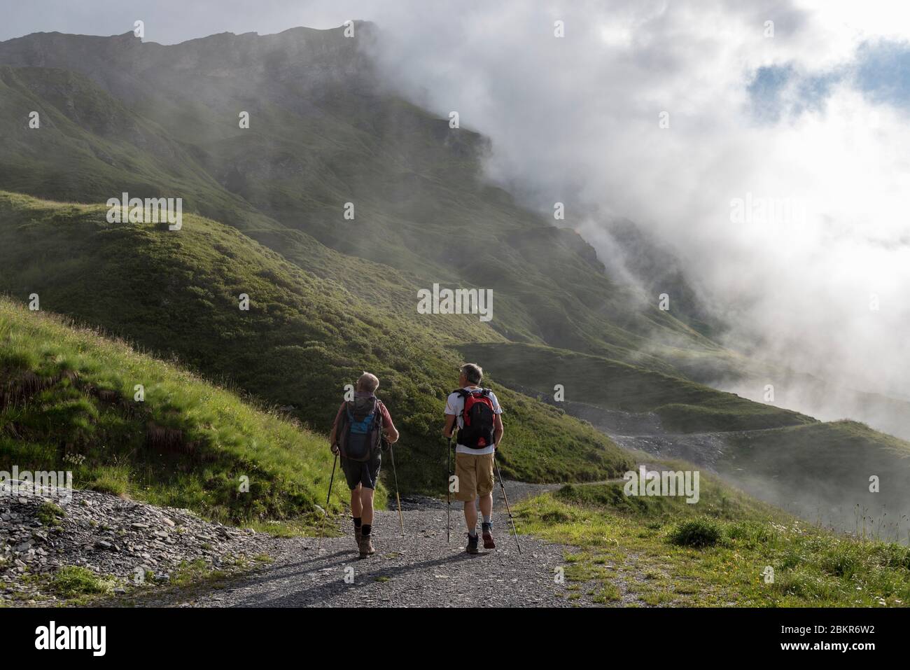 France, Haute-Savoie (74), Passy, Plaine Joux, hikers walking in the morning mists towards the Refuge de Mo?de-Anterne Stock Photo