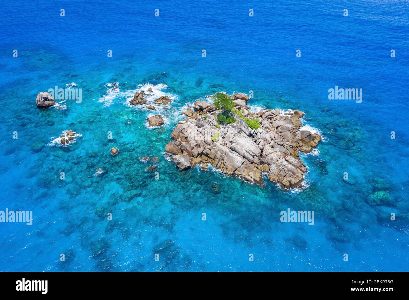Seychelles, Digue island, Av? Maria island, turquoise sea (aerial view) Stock Photo