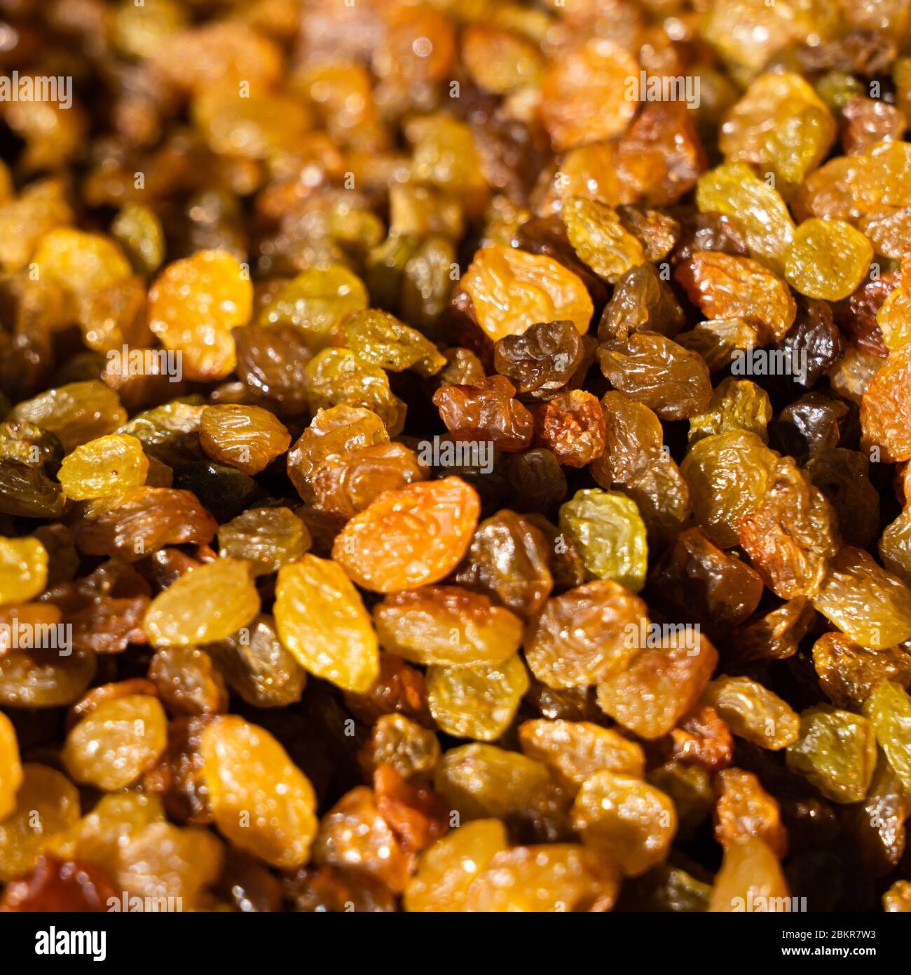 Raisins. Macro. Raisins as background Grape Raisin texture Stock Photo