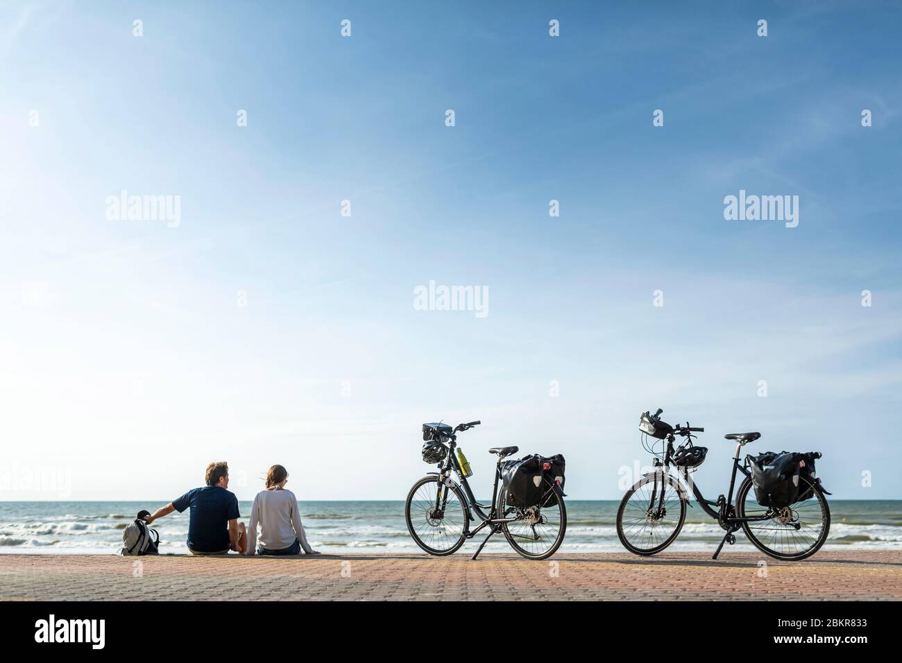 France, Nord, Bray-Dunes, Dune du Perroquet, cycle tourists along the Maritime Bicycle route Stock Photo