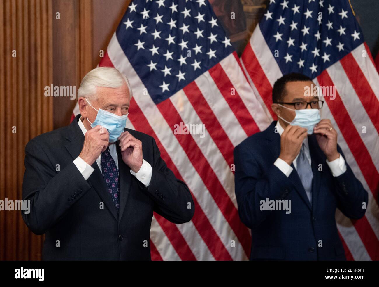 Washington, United Stats. 05th May, 2020. House Majority Leader Steny Hoyer, D-MD, (L) and Rep. Kweisi Mfume, D-MD, adjusts their mask at the ceremonial swearing-in for Mfume, at the U.S. Capitol in Washington, DC on Tuesday, May 5, 2020. Mfume was voted in to replace the later Rep. Elija Cummings. Photo by Kevin Dietsch/UPI Credit: UPI/Alamy Live News Stock Photo