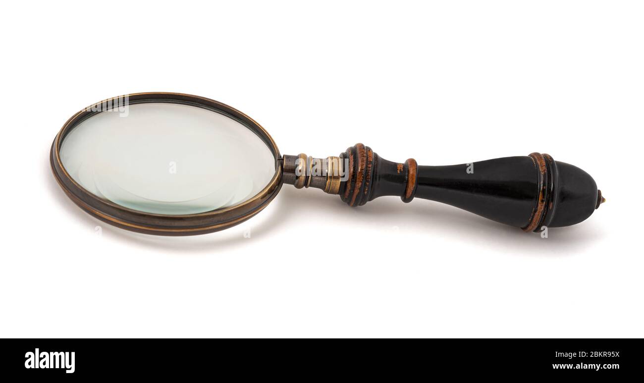 Vintage magnifying glass isolated on white background Stock Photo - Alamy