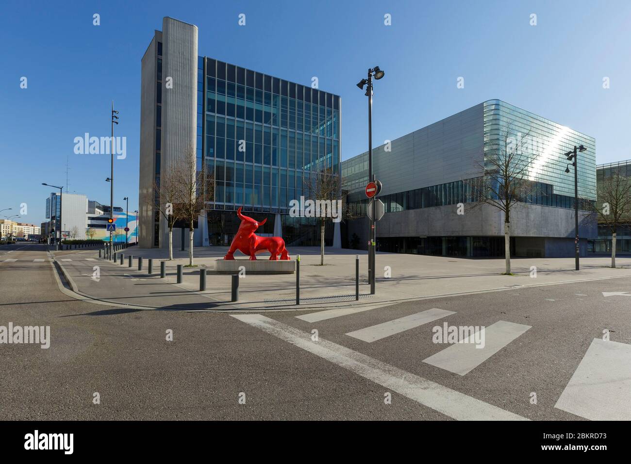 France, Meurthe et Moselle, Nancy, Covid 19 or Coronavirus lockdown, Nancy Gare area, sculpture called Le Taureau (The Bull) by Ge Pellini in front of the Centre des Congres Jean Prouve as part of the ADN (Art Dans Nancy) project Stock Photo