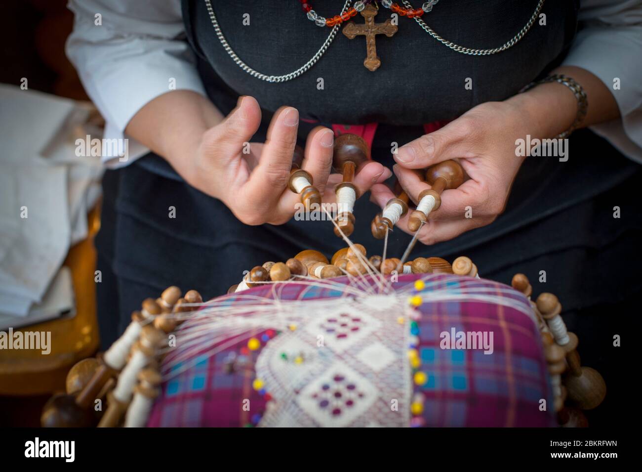 Italy, Aosta Valley, Cogne Valley, traditional crafts very alive: Cogne lace, tiles and shuttles are the tools necessary for the activity Stock Photo