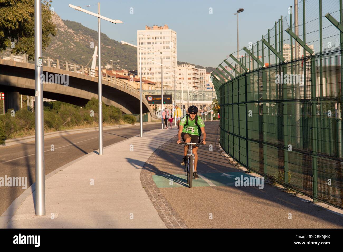 France, Var, Toulon, Bon Rencontre district, A50 motorway, Palais des Sports, cycling on cycle track Stock Photo