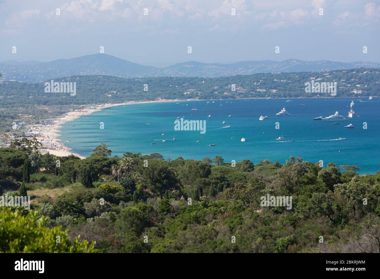 France, Var, Ramatuel, Saint Tropez peninsula, Pampelonne beach and its yachts from Cap Camarat Stock Photo