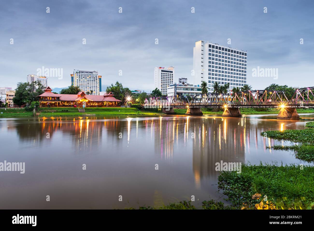 Chiang Mai, Thailand hotel skyline on the Ping River at dusk. Stock Photo