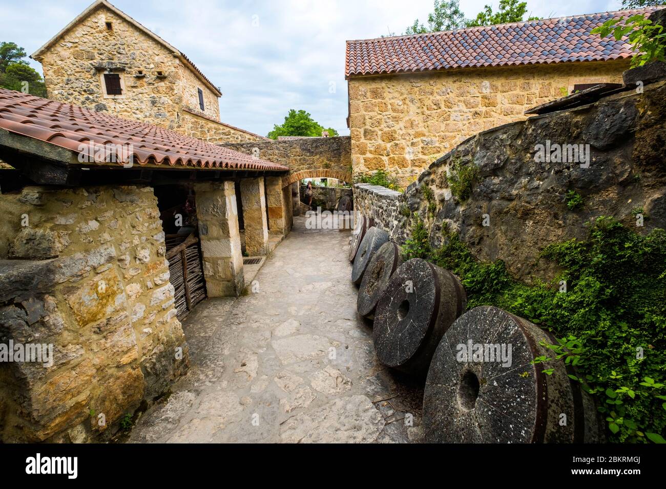 Croatia, Dalmatia, Krka National Park, grain and wool eco-museum (millstones, fullers, washing tubs) Stock Photo