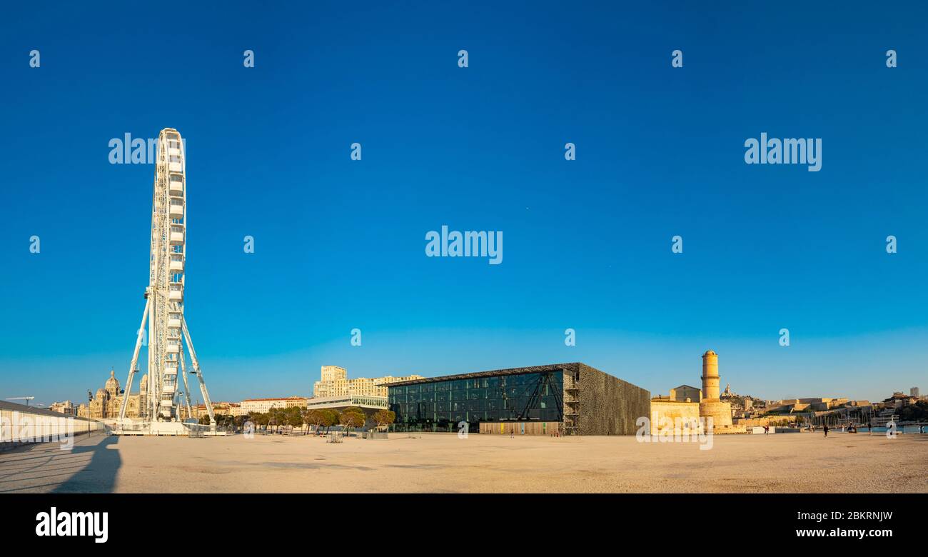 France, Bouches du Rhone, Marseille, Covid-19 or Coronavirus lockdown, Esplanade J4, MuCEM or Museum of Civilizations in Europe and the Mediterranean, architect Rudy Ricciotti, the Ferris Wheel Stock Photo