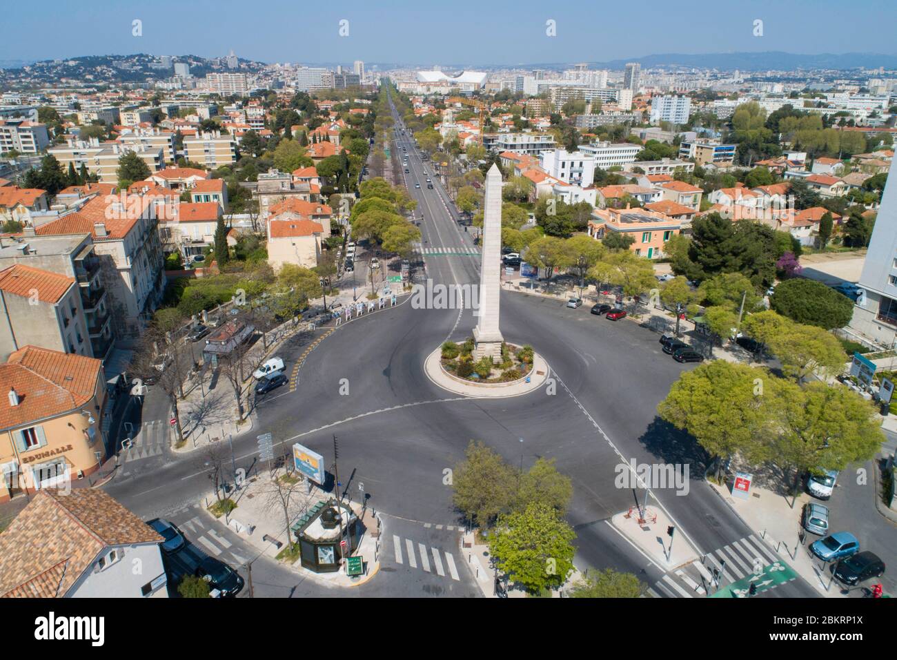 France, Bouches du Rhone, Marseille, Covid 19 or Coronavirus lockdown, 9th arrondissement, obelisk at the Mazargues roundabout (aerial view) Stock Photo