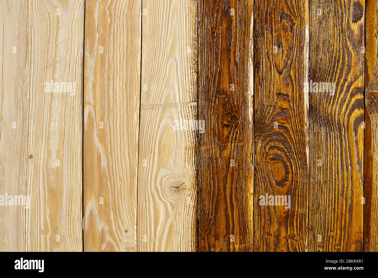 Adult carpenter craftsman painting with waterbased paint the wood. Housework, do it yourself