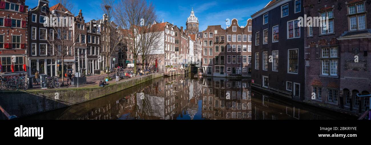 Amsterdam, Netherlands - February 2016:,Panorama of the  canal in the Red Light Area Stock Photo