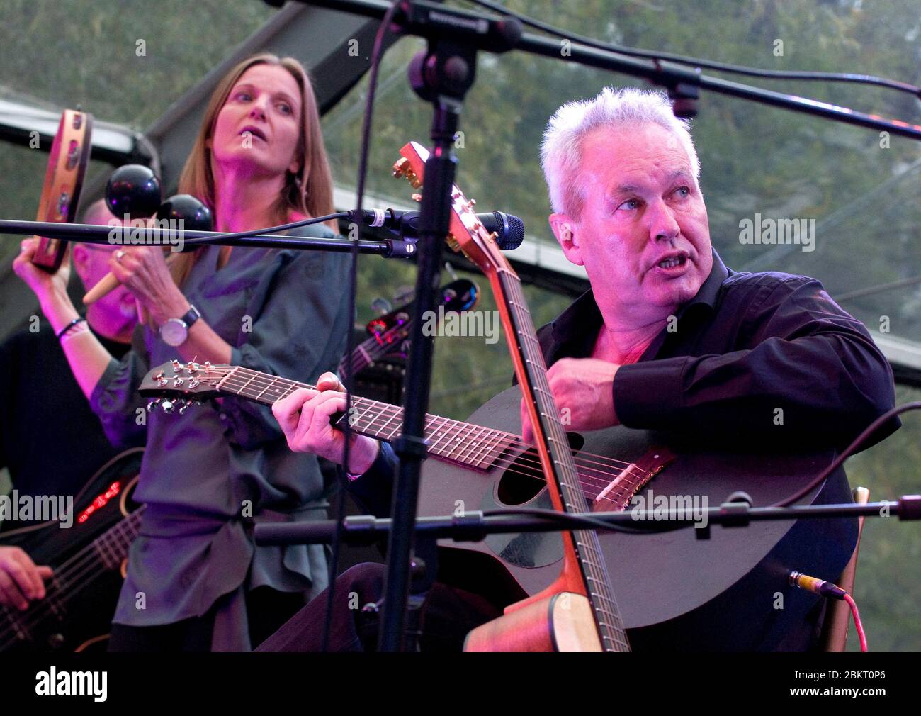 British progressive rock/ folk band Comus perform at the Moseley Folk Festival. Bobbie Watson standing with percussin and Roger Wootton seated with guitar. 5th September 2009 Stock Photo