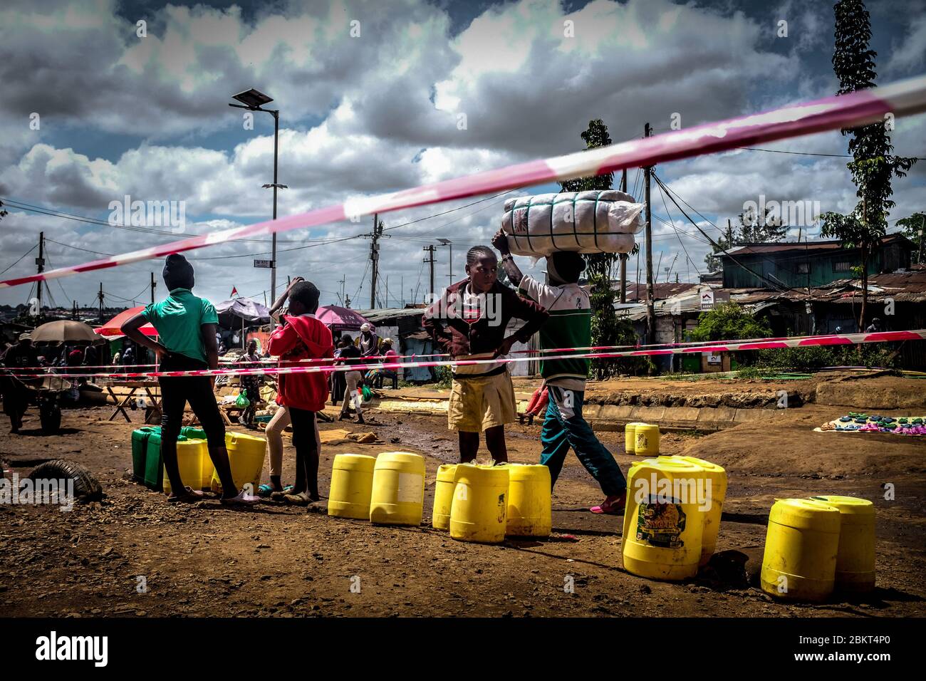 Nairobi, Kenya. 5th May, 2020. Kids que up in line with their empty
