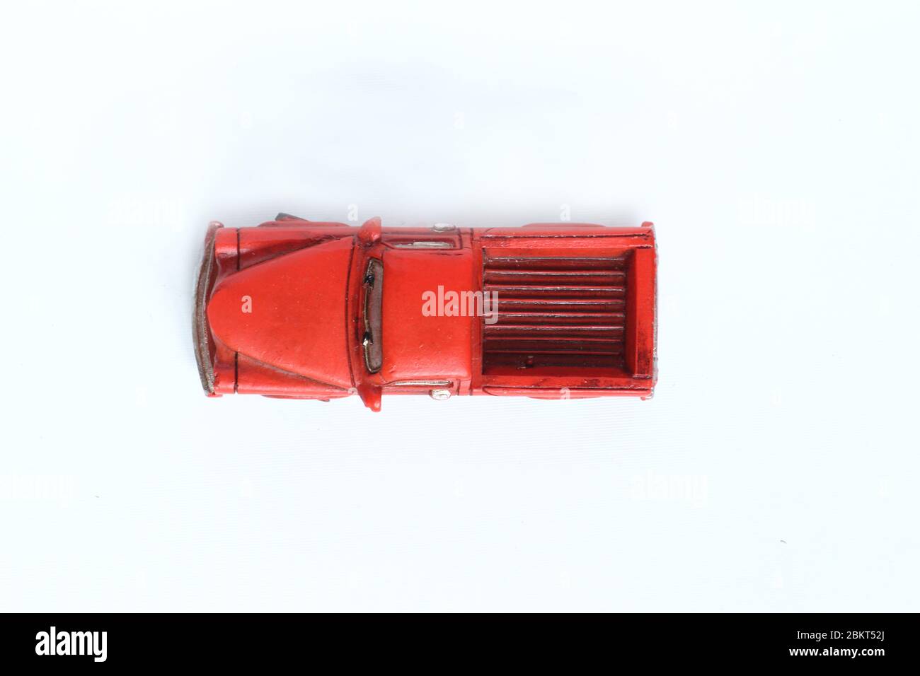 toy red pickup isolated on white background flat lay. Image contains copy space Stock Photo