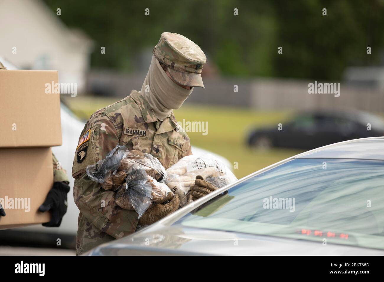 North Carolina State National Guard soldiers assist with food