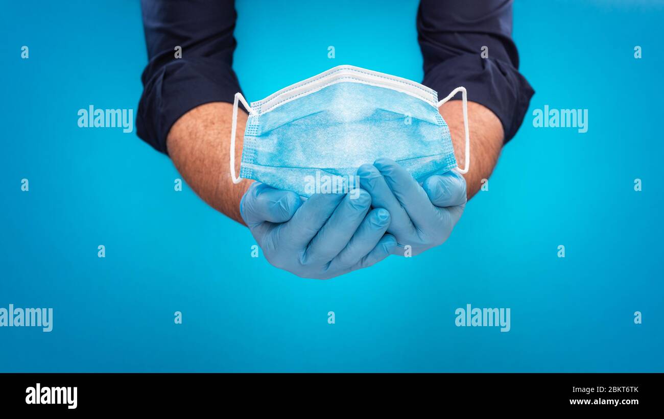 Coronavirus Prevention Hands Protected By Latex Gloves Deliver A coronavirus-prevention-hands-protected-by-latex-gloves-deliver-a