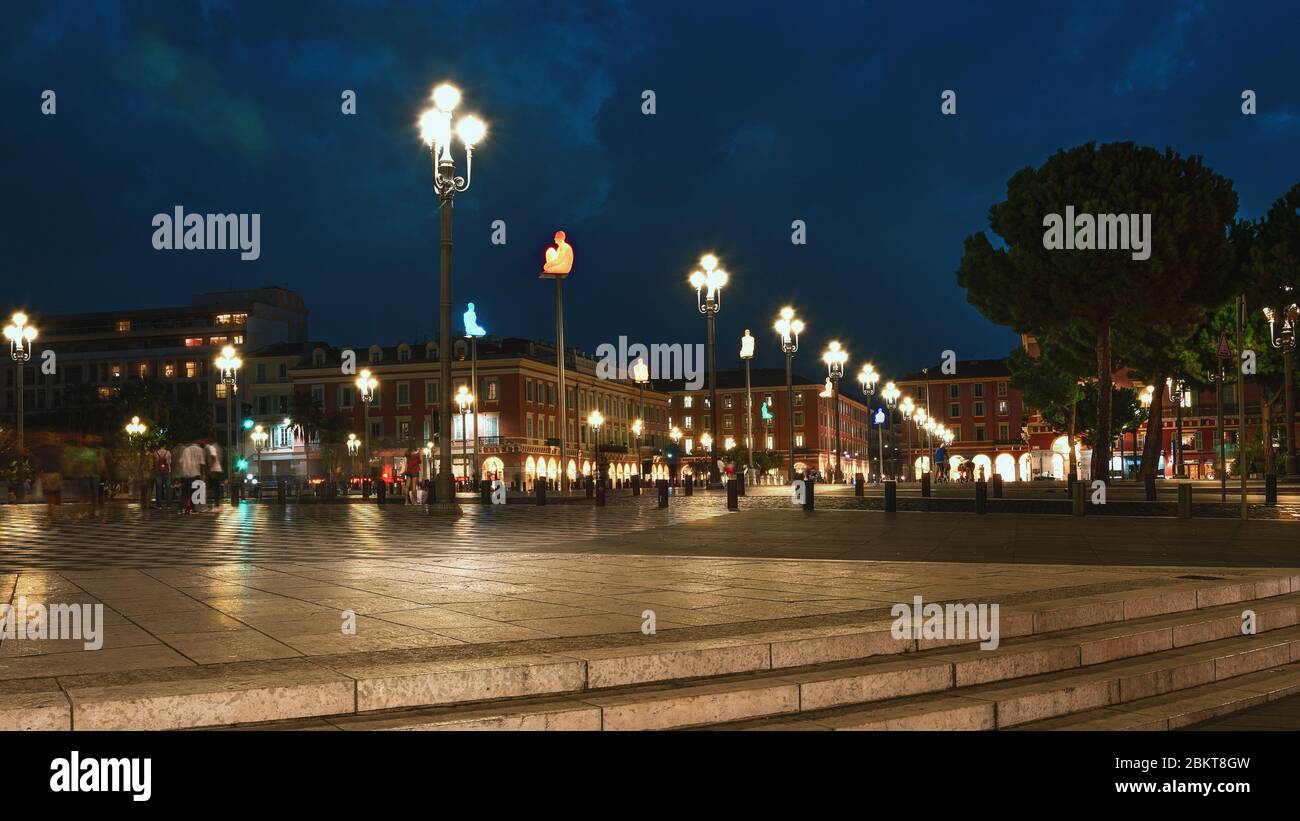 Nice, France, September 20, 2018:  On this photo the seven illuminated statues on Place Massena in the center of Nice made by the Spanish sculptor Jau Stock Photo
