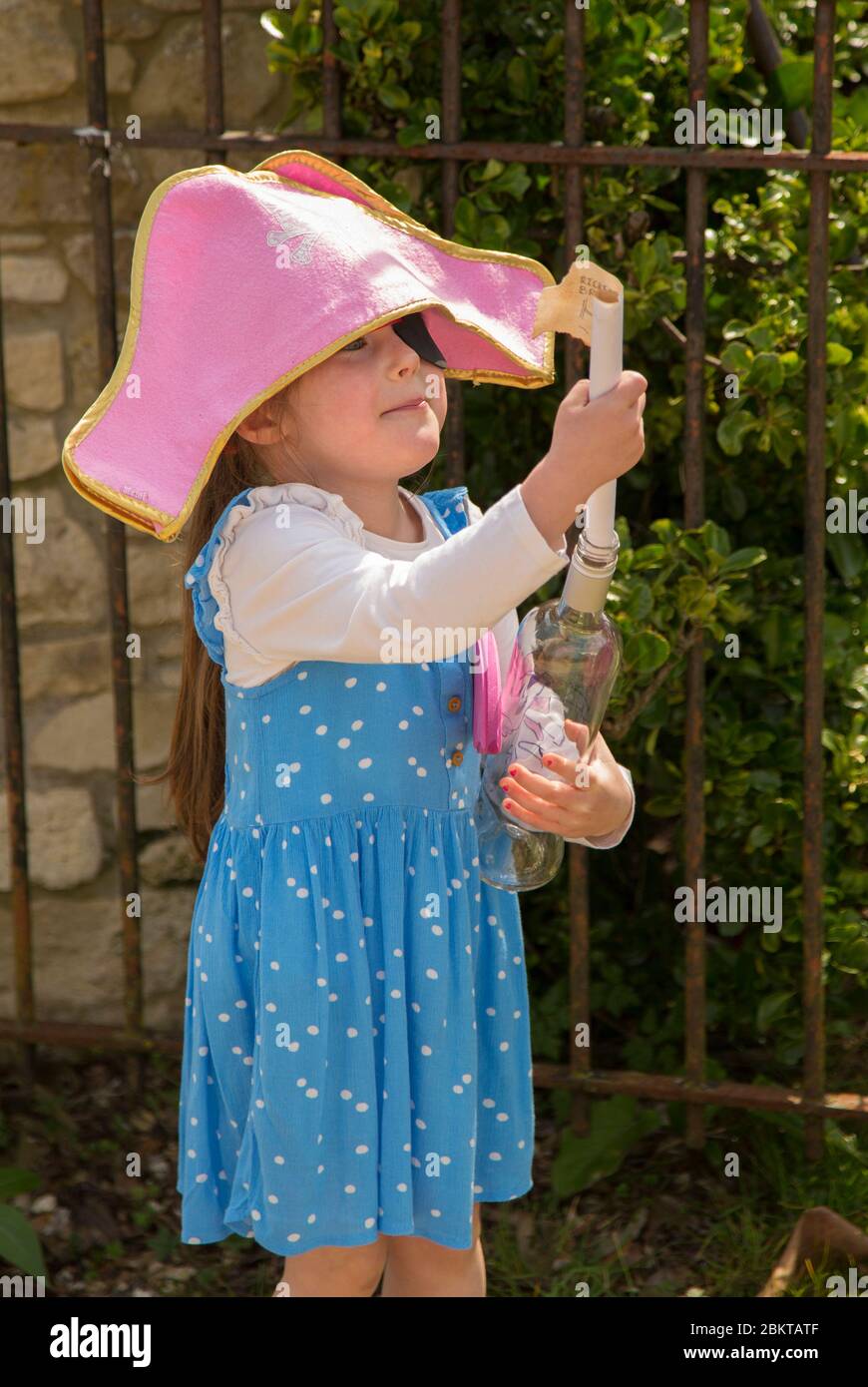young girl on a pirate treasure hunt Stock Photo