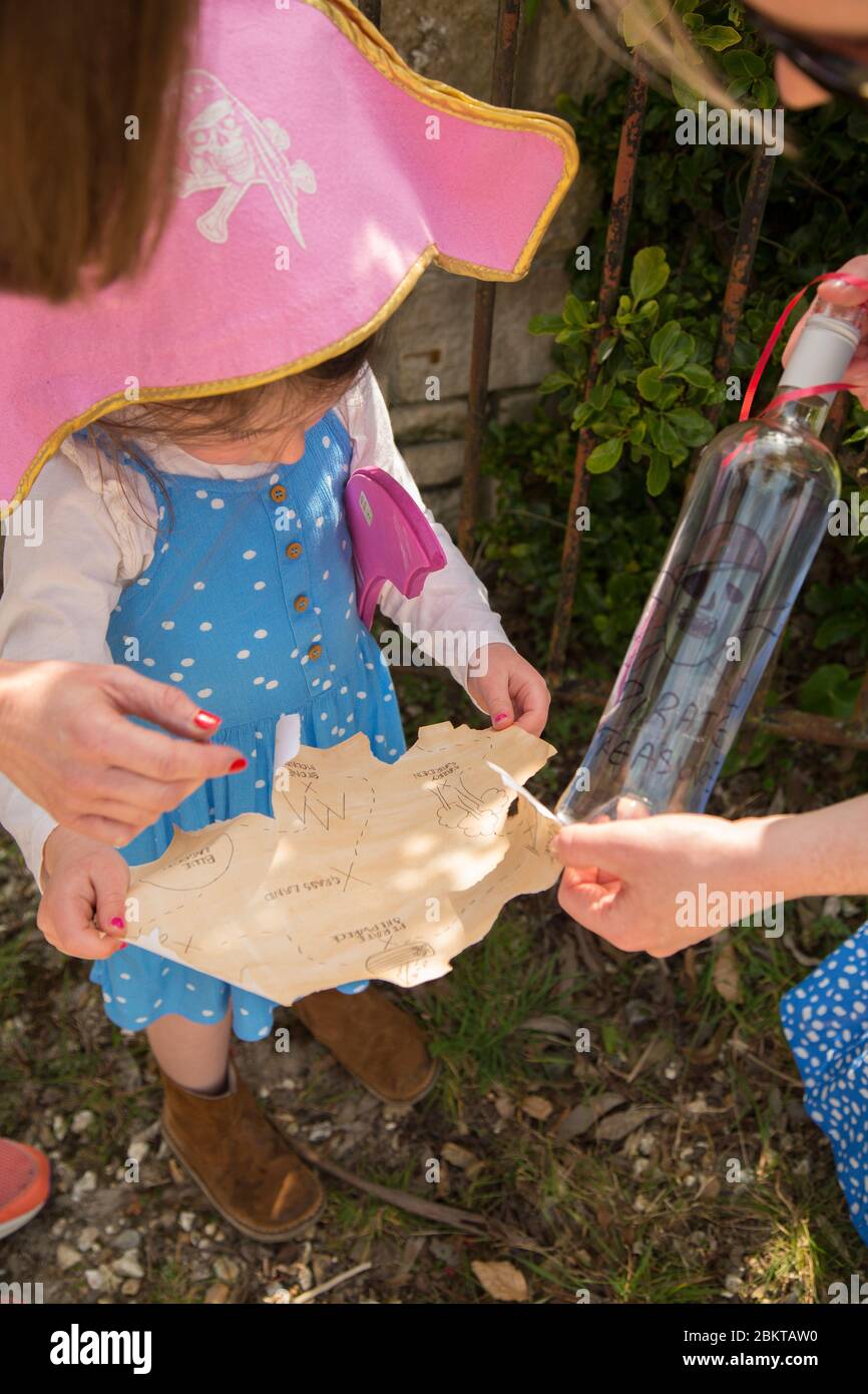 young girl on a pirate treasure hunt Stock Photo
