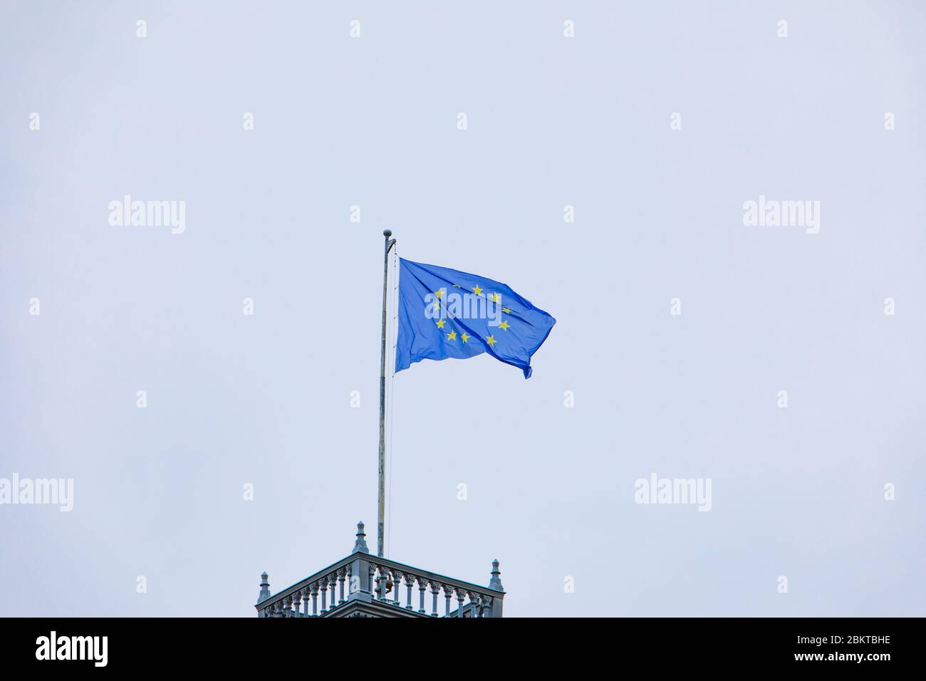 european union flag in front of blue sky Stock Photo - Alamy