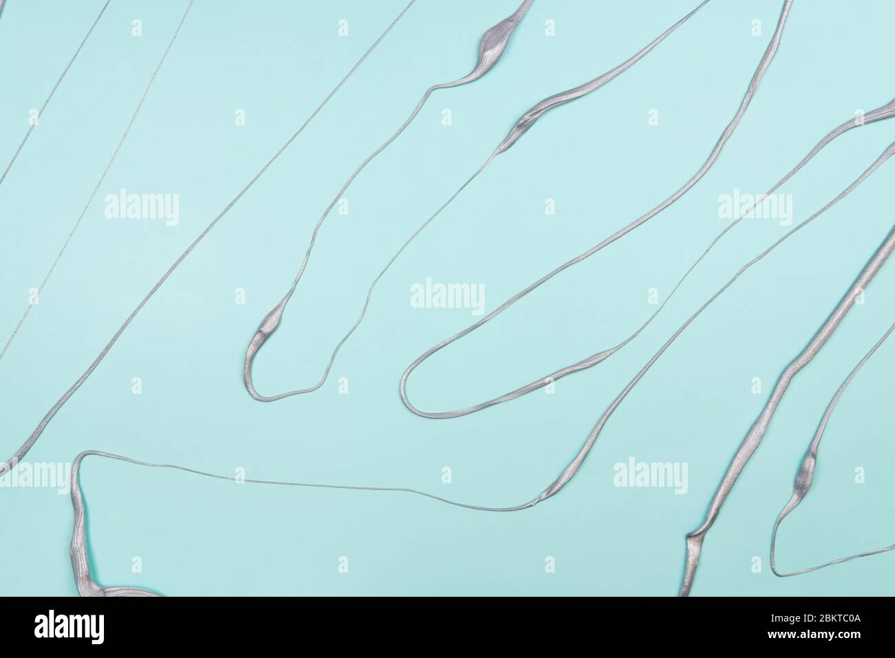Abstract blue background with metallic silver lines. Perfect backdrop for your text. Stock Photo
